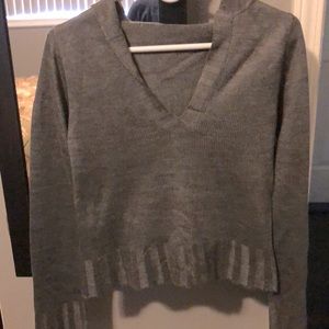 Grey hoodie sweater.